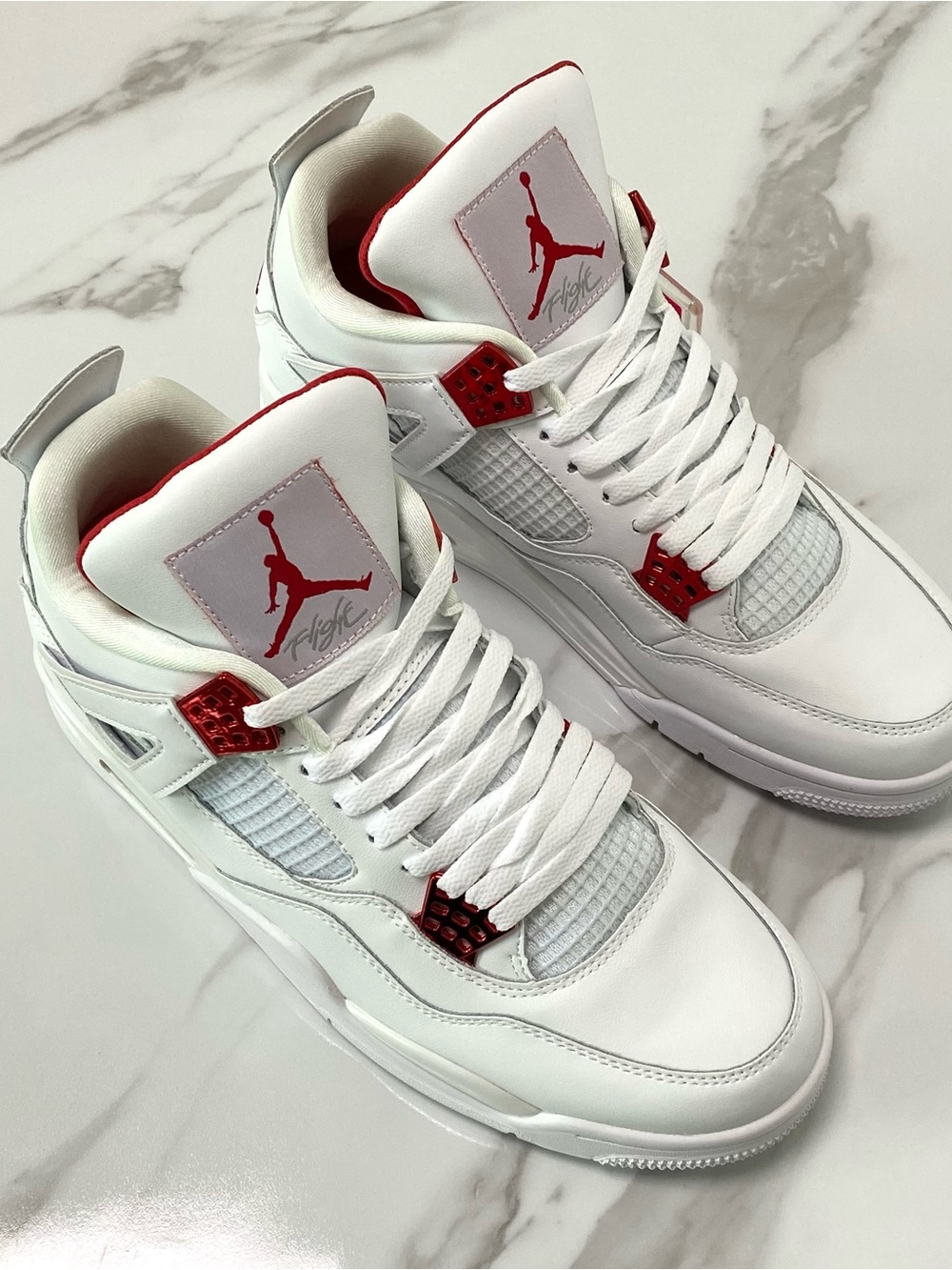 Jordan Retro Sneakers in White with Red Accents